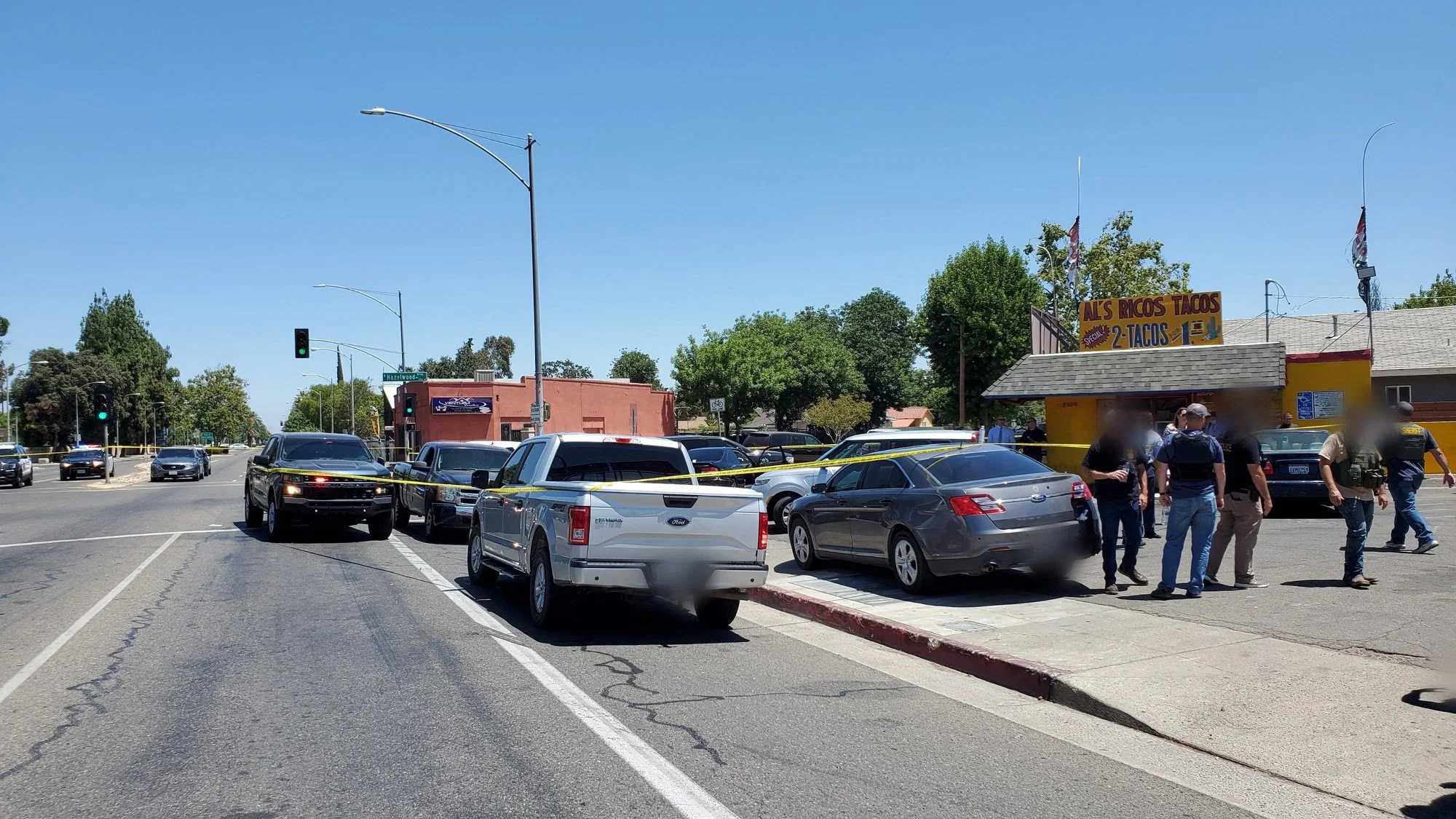 Suspect dies after he rams car into police vehicles, sparks officer-involved shooting, police say